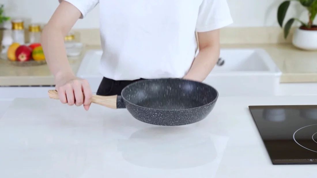 The 11-inch saute pan under its glass lid, waiting on the counter.