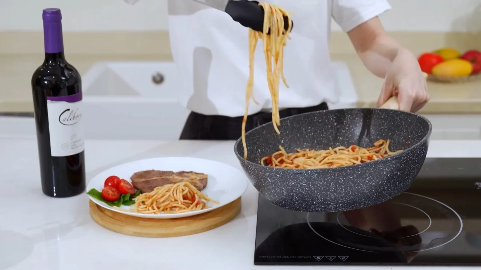 Spaghetti lifted from a SODAY granite saute pan at the stove